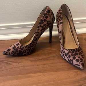 Leopard print stiletto heels.